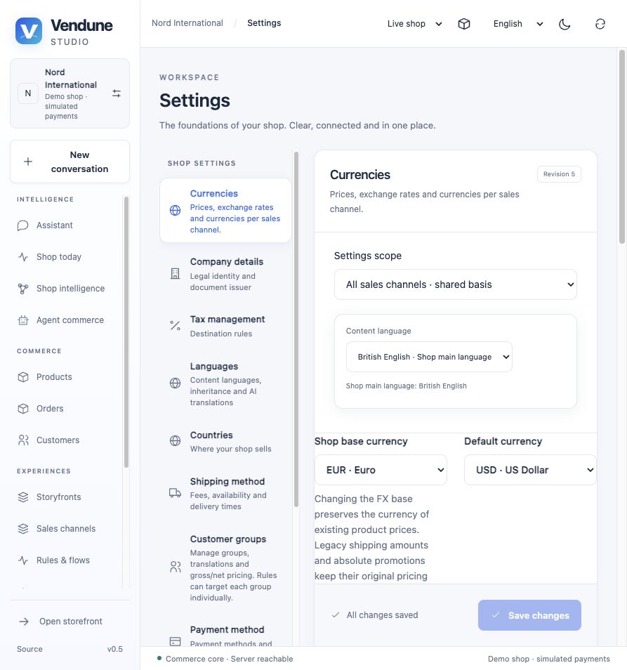 English Studio currency settings with a shared EUR base and USD storefront default